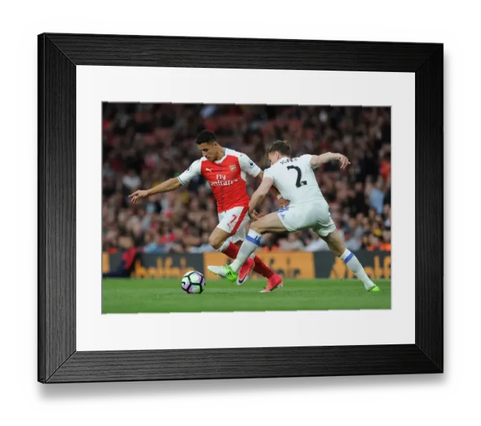 Framed Print : Arsenal's Alexis Sanchez Clashes with Sunderland's Billy Jones in Premier League Showdown Framed Print : Arsenal's Alexis Sanchez Clashes with Sunderland's Billy Jones in Premier League Showdown