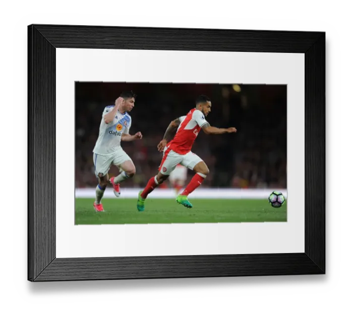 Framed Print : Theo Walcott vs. Bryan Oviedo: A Battle at the Emirates - Arsenal v Sunderland, Premier League 2016-17