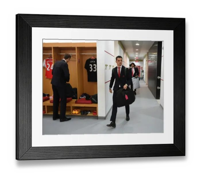 Framed Print : Arsenal's Granit Xhaka in the Home Changing Room before Arsenal vs Everton (2016-17)