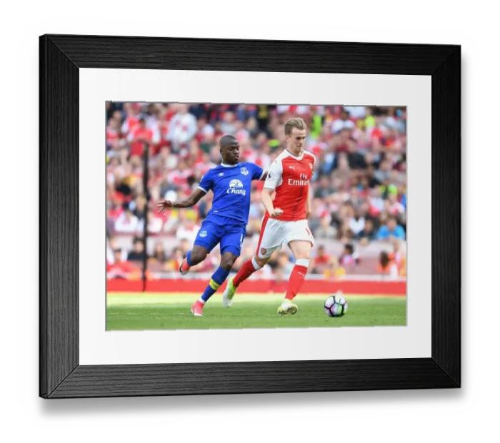 Framed Print : Holding vs Valencia: A Premier League Showdown at Emirates Stadium