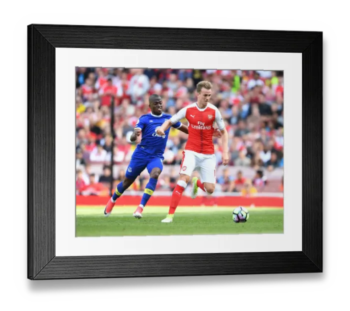 Framed Print : Clash at the Emirates: Holding vs Valencia, Arsenal vs Everton, Premier League Framed Print : Clash at the Emirates: Holding vs Valencia, Arsenal vs Everton, Premier League