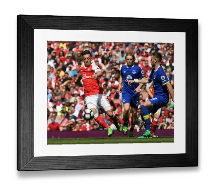 Framed Print : Mesut Ozil vs. Morgan Schneiderlin: A Battle in the Arsenal v Everton Premier League Clash Framed Print : Mesut Ozil vs. Morgan Schneiderlin: A Battle in the Arsenal v Everton Premier League Clash