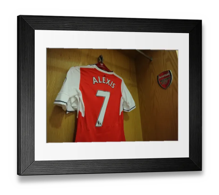 Framed Print : Arsenal: Alexis Sanchez's Emirates Jersey Hanging in the Changing Room Before Arsenal vs. Everton (2016-17) Framed Print : Arsenal: Alexis Sanchez's Emirates Jersey Hanging in the Changing Room Before Arsenal vs. Everton (2016-17)