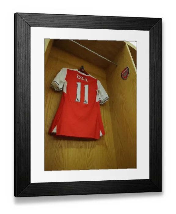 Framed Print : Mesut Ozil's Arsenal Shirt in the Changing Room Before Arsenal vs. Everton (2016-17) Framed Print : Mesut Ozil's Arsenal Shirt in the Changing Room Before Arsenal vs. Everton (2016-17)