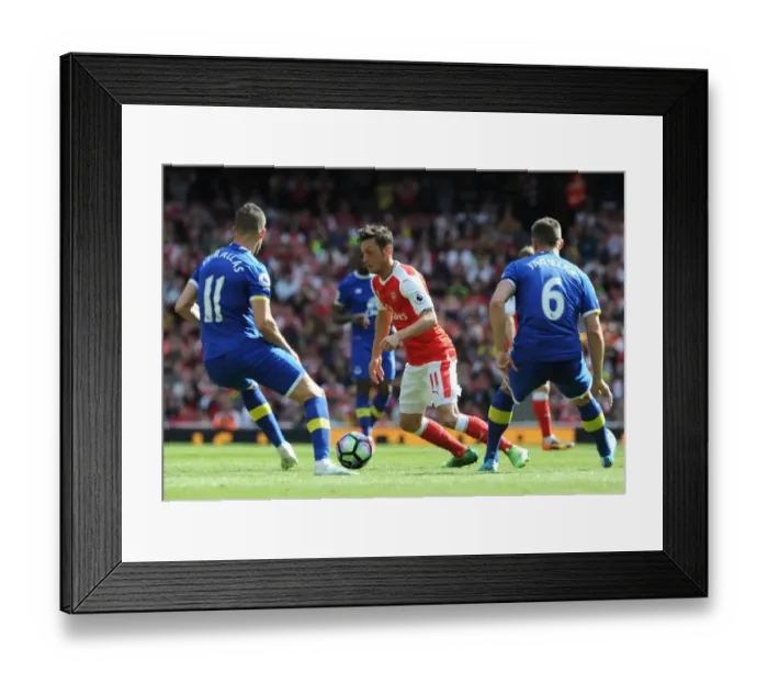 Framed Print : Mesut Ozil vs. Kevin Mirallas and Phil Jagielka: Intense Battle at Arsenal v Everton (2016-17)