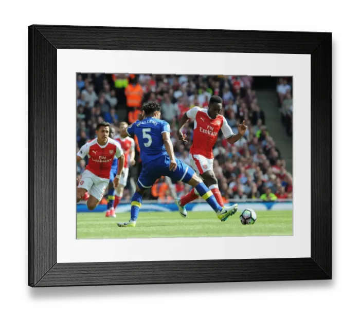 Framed Print : Clash at the Emirates: Welbeck vs. Williams in Arsenal's Battle Against Everton (2016-17)