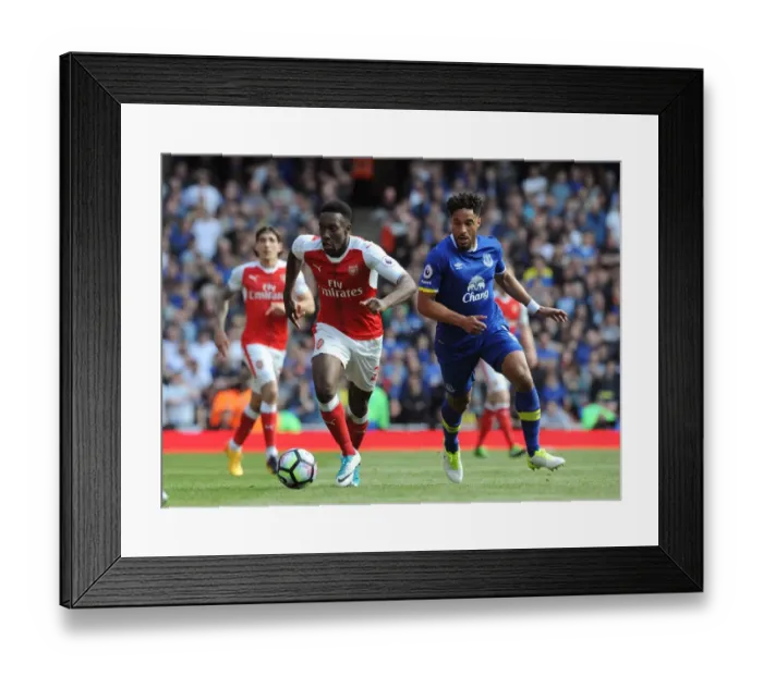 Framed Print : Clash at the Emirates: Welbeck vs. Williams in Premier League Showdown