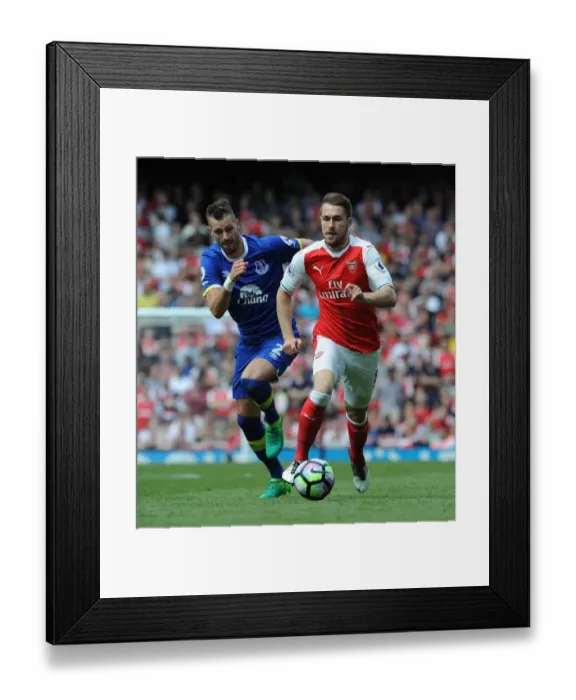 Framed Print : Arsenal's Ramsey Clashes with Everton's Schneiderlin in Premier League Showdown Framed Print : Arsenal's Ramsey Clashes with Everton's Schneiderlin in Premier League Showdown