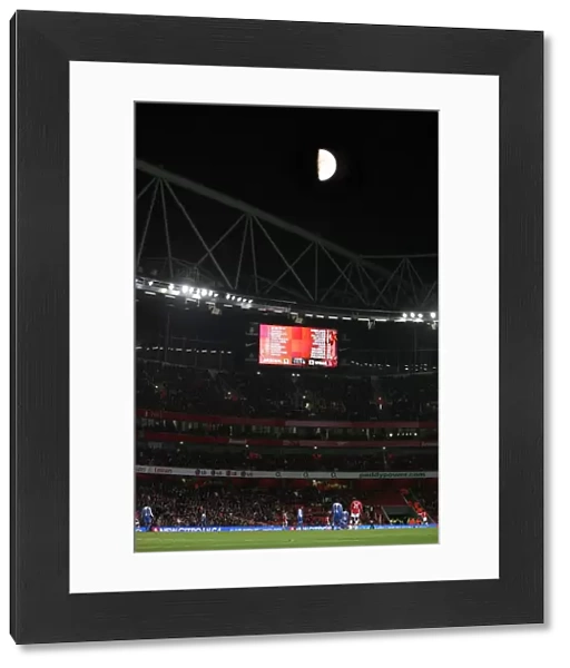 The moon over Emirates Stadium