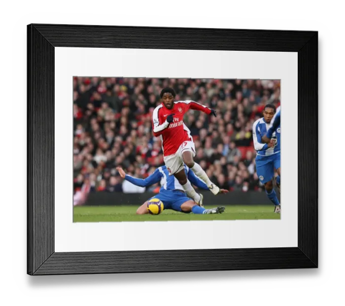 Framed Print : Clash of the Midfielders: Song vs. Cattermole in Arsenal's 1-0 Win over Wigan, 2008