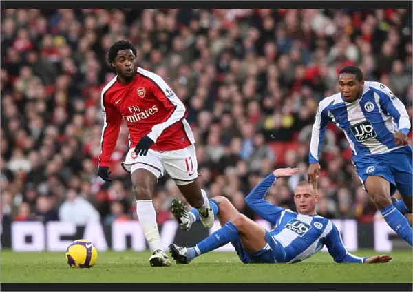 Alex Song (Arsenal) Lee Cattermole (Wigan)