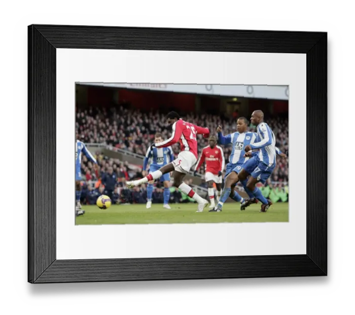 Framed Print : Emmanuel Adebayor scores Arsenals goal under pressure Framed Print : Emmanuel Adebayor scores Arsenals goal under pressure