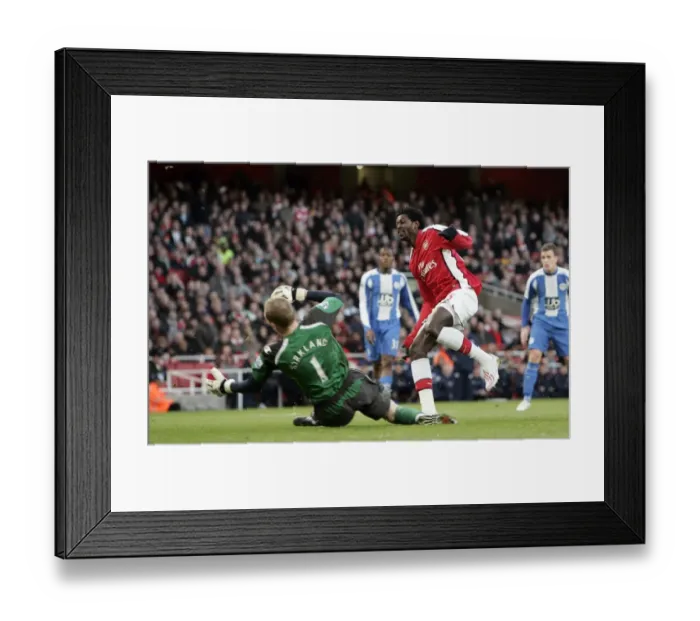Framed Print : Emmanuel Adebayor scores Arsenals goal past Chris Kirkland (Wigan)