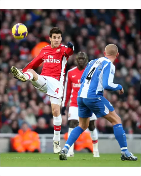 Cesc Fabregas (Arsenal) Lee Cattermole (Wigan)
