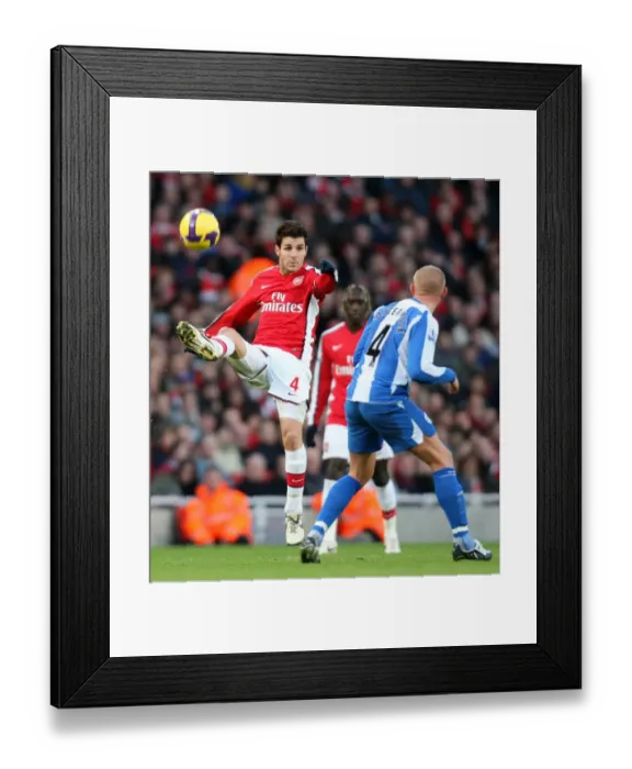 Framed Print : Cesc Fabregas (Arsenal) Lee Cattermole (Wigan) Framed Print : Cesc Fabregas (Arsenal) Lee Cattermole (Wigan)