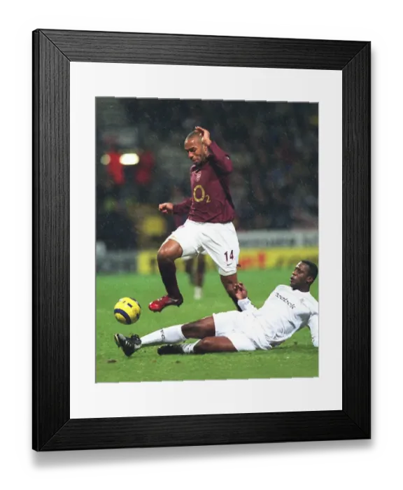 Framed Print : Thierry Henry (Arsenal) Bruno N Gotty (Bolton). Bolton Wanderers 2: 0 Arsenal Framed Print : Thierry Henry (Arsenal) Bruno N Gotty (Bolton). Bolton Wanderers 2: 0 Arsenal