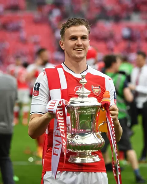 Rob Holding Lifts the FA Cup: Arsenal's Triumph over Chelsea