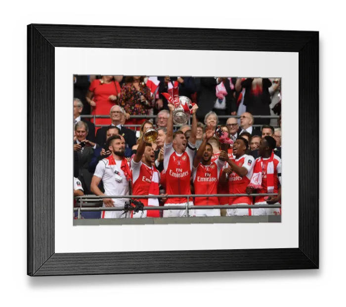 Framed Print : Arsenal's Rob Holding Lifts FA Cup after Arsenal v Chelsea Final Victory