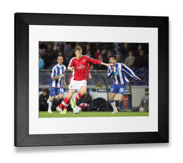 Framed Print : Bendtner's Double Trouble: FC Porto Outshines Arsenal in Champions League Showdown Framed Print : Bendtner's Double Trouble: FC Porto Outshines Arsenal in Champions League Showdown