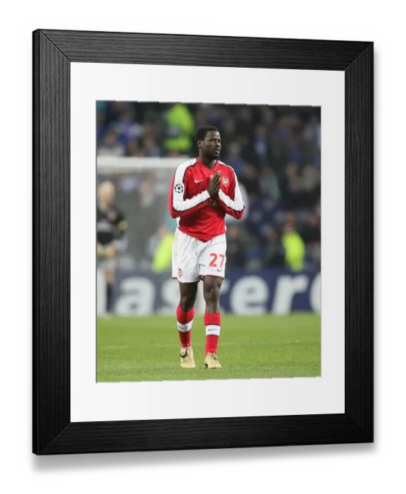 Framed Print : Emmanuel Eboue vs FC Porto: Arsenal's Defensive Battle in Champions League Group G