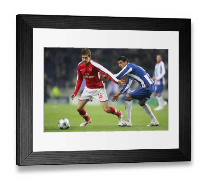 Framed Print : Aaron Ramsey (Arsenal) Lucho (FC Porto) Framed Print : Aaron Ramsey (Arsenal) Lucho (FC Porto)