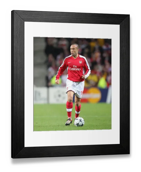 Framed Print : Mickael Silvestre vs. FC Porto: Arsenal's Defensive Battle in the Champions League Framed Print : Mickael Silvestre vs. FC Porto: Arsenal's Defensive Battle in the Champions League