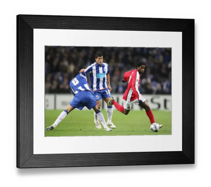 Framed Print : Champions League Showdown: Lucho and Hulk of FC Porto Outshine Alex Song of Arsenal in a 2:0 Victory