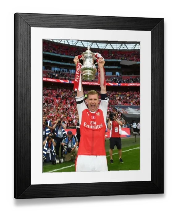 Framed Print : Per Mertesacker's Triumph: Arsenal's FA Cup Victory over Chelsea