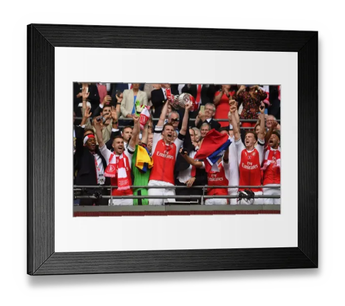 Framed Print : Per Mertesacker Lifts FA Cup: Arsenal's Victory over Chelsea (2017) Framed Print : Per Mertesacker Lifts FA Cup: Arsenal's Victory over Chelsea (2017)