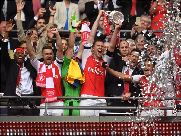 Arsenal's Per Mertesacker Lifts FA Cup after Arsenal v Chelsea Final Victory