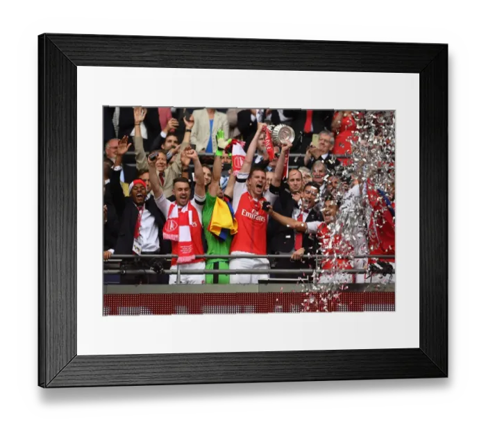 Framed Print : Arsenal's Per Mertesacker Lifts FA Cup after Arsenal v Chelsea Final Victory Framed Print : Arsenal's Per Mertesacker Lifts FA Cup after Arsenal v Chelsea Final Victory