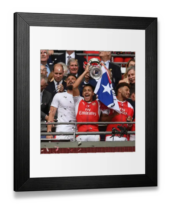 Framed Print : Alexis Sanchez Lifts FA Cup: Arsenal Defeats Chelsea in 2017 Final
