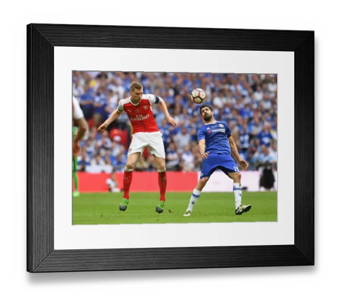 Framed Print : Clash of Titans: Per Mertesacker vs. Diego Costa - The FA Cup Final Showdown Framed Print : Clash of Titans: Per Mertesacker vs. Diego Costa - The FA Cup Final Showdown