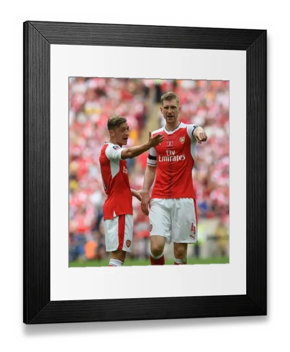 Framed Print : Arsenal's Per Mertesacker and Mesut Ozil during the FA Cup Final against Chelsea, London 2017