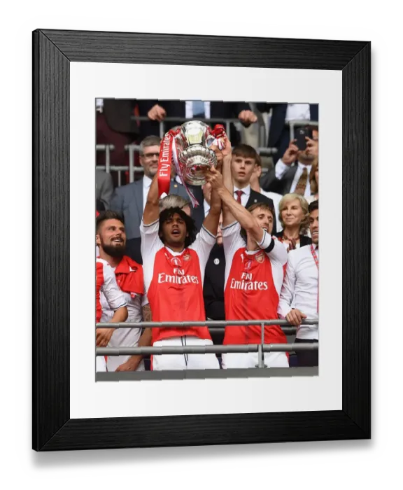 Framed Print : Arsenal Celebrate FA Cup Victory: Elneny and Monreal Lift the Trophy (Arsenal v Chelsea, 2017)