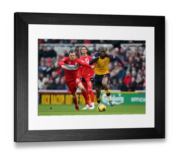 Framed Print : Abou Diaby vs. Adam Johnson: 1:1 Stalemate in the Barclays Premier League at Middlesbrough's Riverside Stadium, December 13, 2008 Framed Print : Abou Diaby vs. Adam Johnson: 1:1 Stalemate in the Barclays Premier League at Middlesbrough's Riverside Stadium, December 13, 2008