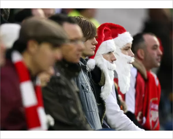 Arsenal fans dressed as Father Christmas