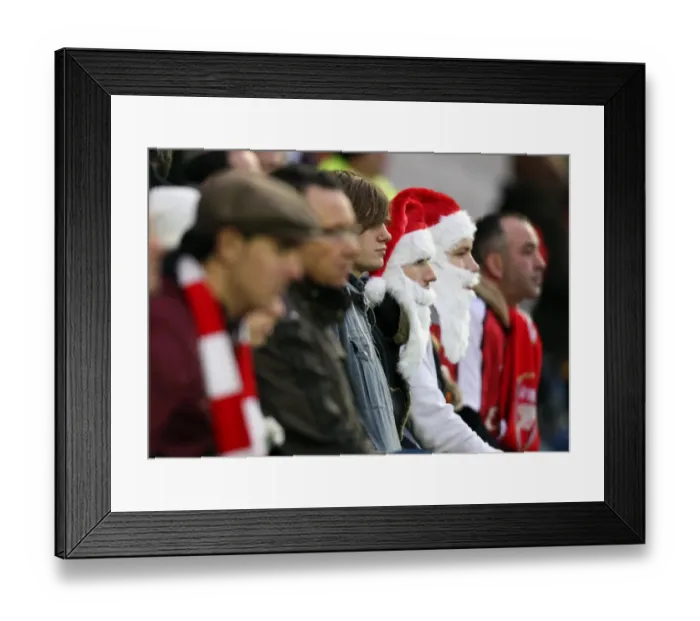 Framed Print : Arsenal fans dressed as Father Christmas Framed Print : Arsenal fans dressed as Father Christmas