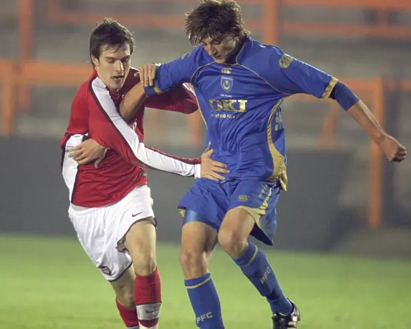 Aaron Ramsey (Arsenal) Tom Kilbey (Portsmouth)