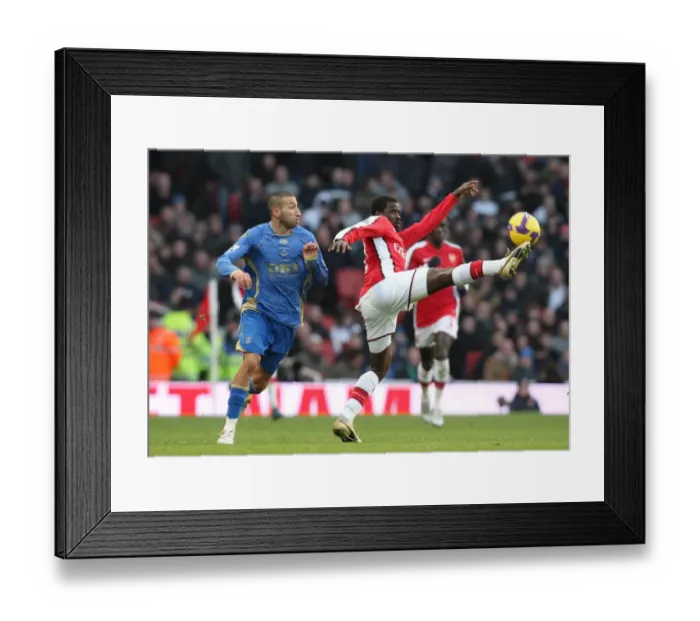 Framed Print : Arsenal's Eboue Clashes with Portsmouth's Belhadj: 1-0 Victory in the Barclays Premier League at Emirates Stadium (December 28, 2008) Framed Print : Arsenal's Eboue Clashes with Portsmouth's Belhadj: 1-0 Victory in the Barclays Premier League at Emirates Stadium (December 28, 2008)