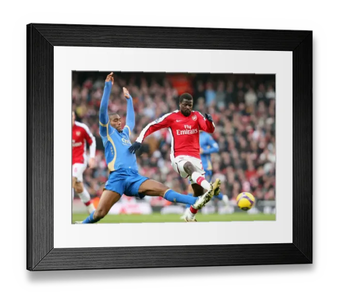 Framed Print : Arsenal's Eboue vs. Distin: Clash of Titans in Arsenal's 1:0 Victory over Portsmouth, Barclays Premier League, Emirates Stadium, 12 / 28 / 08