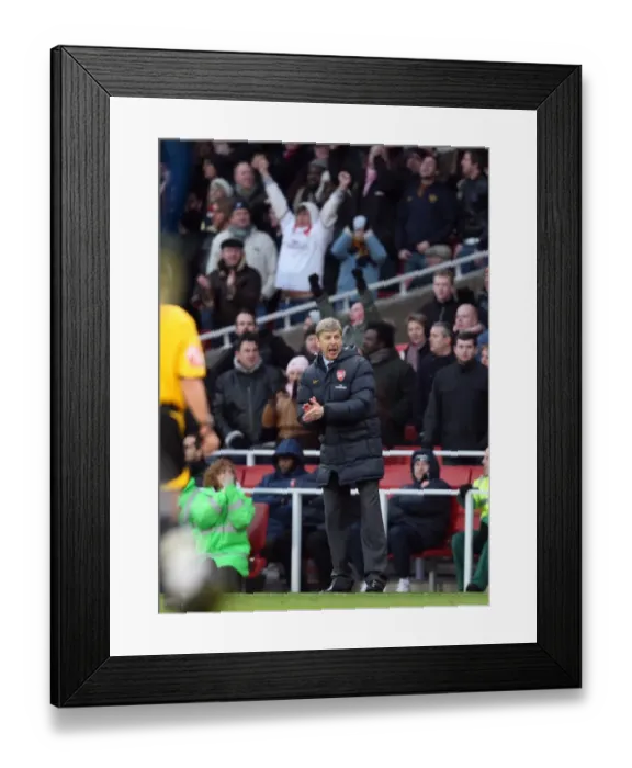 Framed Print : Arsene Wenger Celebrates Arsenal's 1-0 Victory Over Portsmouth in the Barclays Premier League (December 28, 2008)
