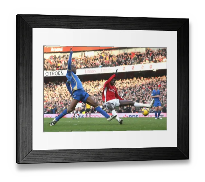 Framed Print : Adebayor vs. Distin: Arsenal's 1-0 Victory over Portsmouth in the Barclays Premier League, Emirates Stadium, London, December 2008 Framed Print : Adebayor vs. Distin: Arsenal's 1-0 Victory over Portsmouth in the Barclays Premier League, Emirates Stadium, London, December 2008