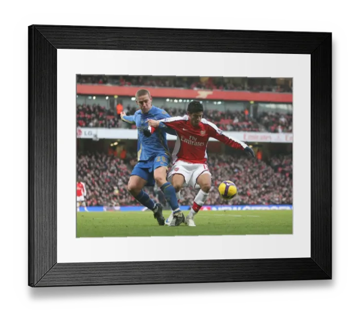Framed Print : Vela vs. Davis: Arsenal's Edge over Portsmouth in the Premier League Clash, December 2008 Framed Print : Vela vs. Davis: Arsenal's Edge over Portsmouth in the Premier League Clash, December 2008
