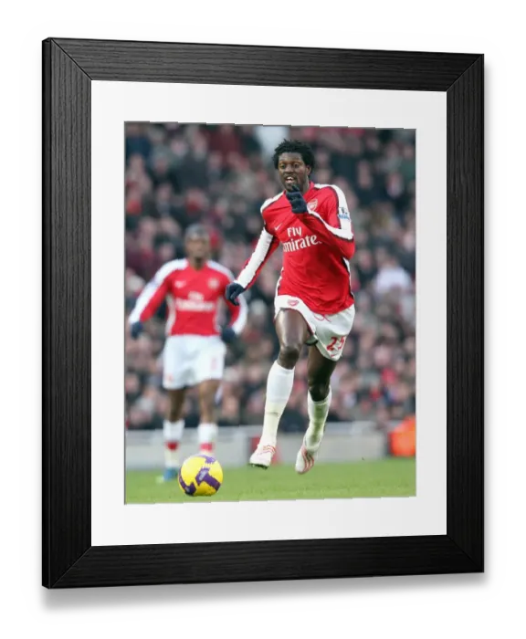 Framed Print : Adebayor's Decisive Strike: Arsenal's 1-0 Victory Over Portsmouth in the Barclays Premier League (December 28, 2008)
