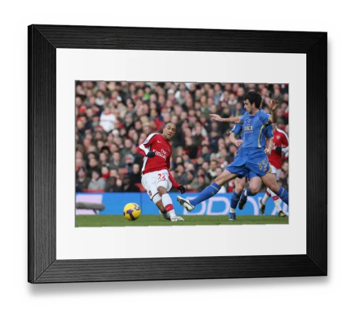 Framed Print : Gael Clichy (Arsenal) Marc Wilson (Portsmouth)