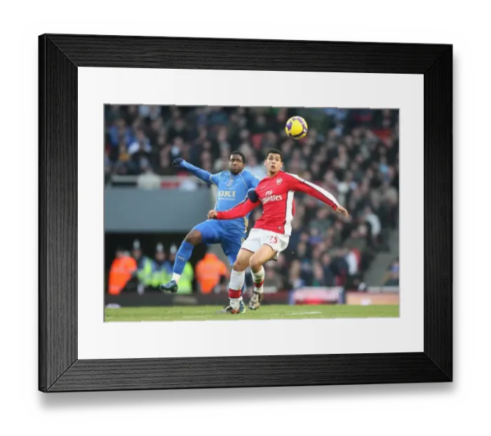 Framed Print : Denilson vs. Mvuemba: Arsenal's 1-0 Victory Over Portsmouth in the Barclays Premier League, Emirates Stadium, London, 28 / 12 / 2008 Framed Print : Denilson vs. Mvuemba: Arsenal's 1-0 Victory Over Portsmouth in the Barclays Premier League, Emirates Stadium, London, 28 / 12 / 2008