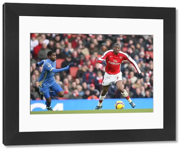 Abou Diaby (Arsenal) Arnold Mvuemba (Portsmouth)