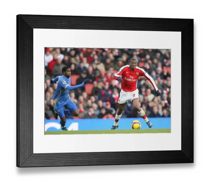 Framed Print : Abou Diaby (Arsenal) Arnold Mvuemba (Portsmouth)