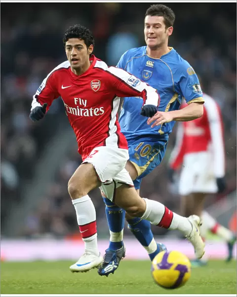 Carlos Vela (Arsenal) David Nugent (Portsmouth)